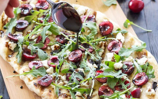 GRILLED CHERRY, GOAT CHEESE, AND ARUGULA PIZZA