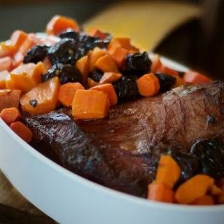 Brisket with Tzimmes & Hard Cider Sauce